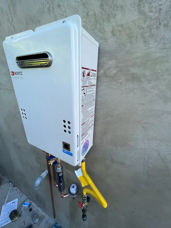 Tankless water heater installation for Kennedy House homes